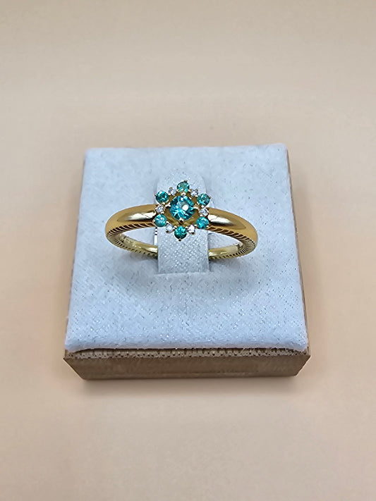 Emerald and diamond flower ring