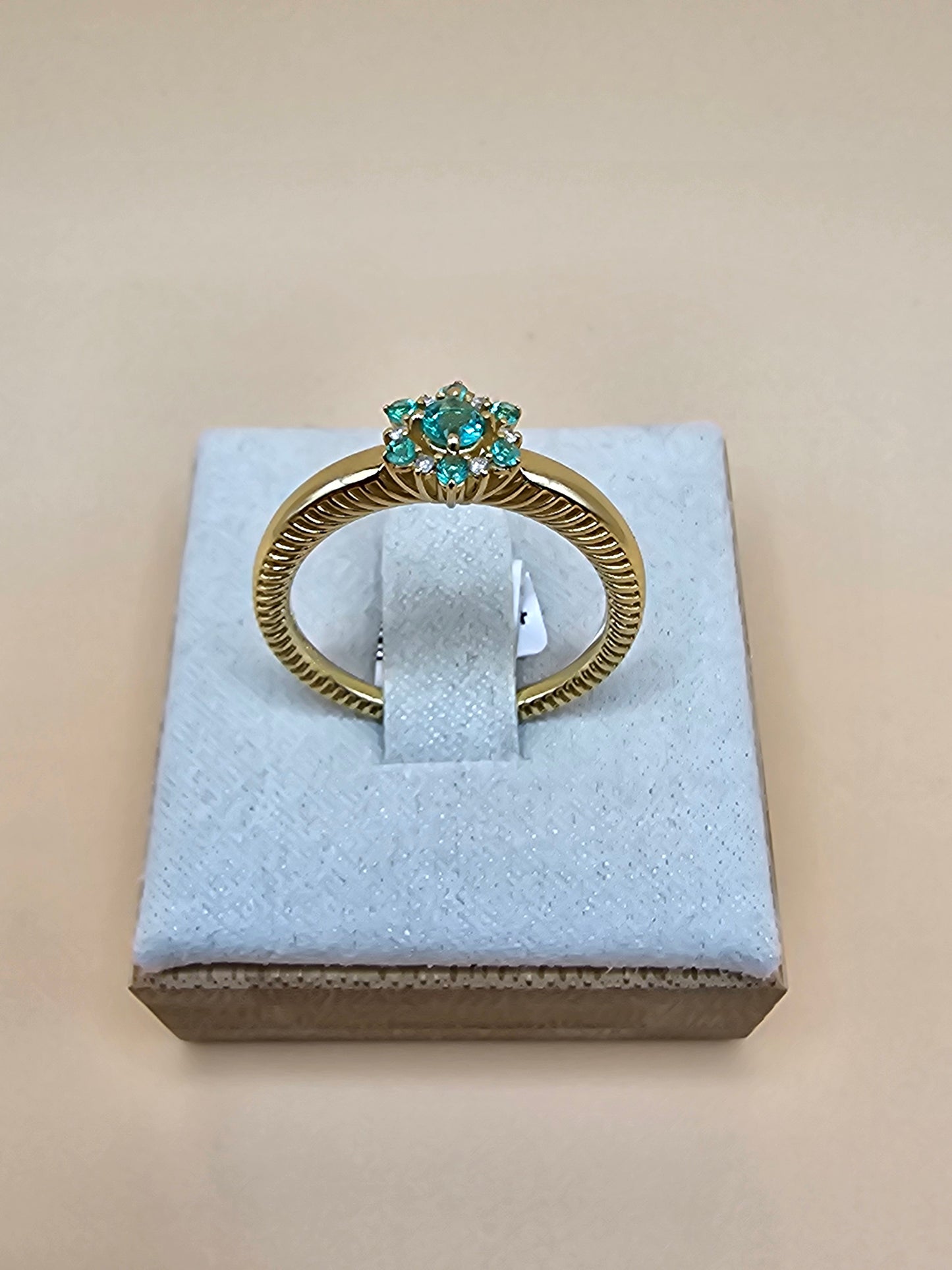 Emerald and diamond flower ring